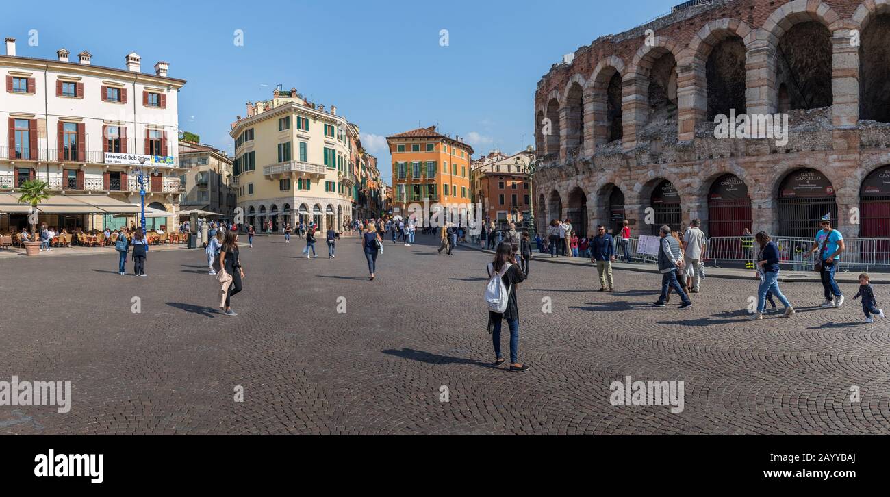 many different tourist in the italian city Verona at the summer time. Stock Photo