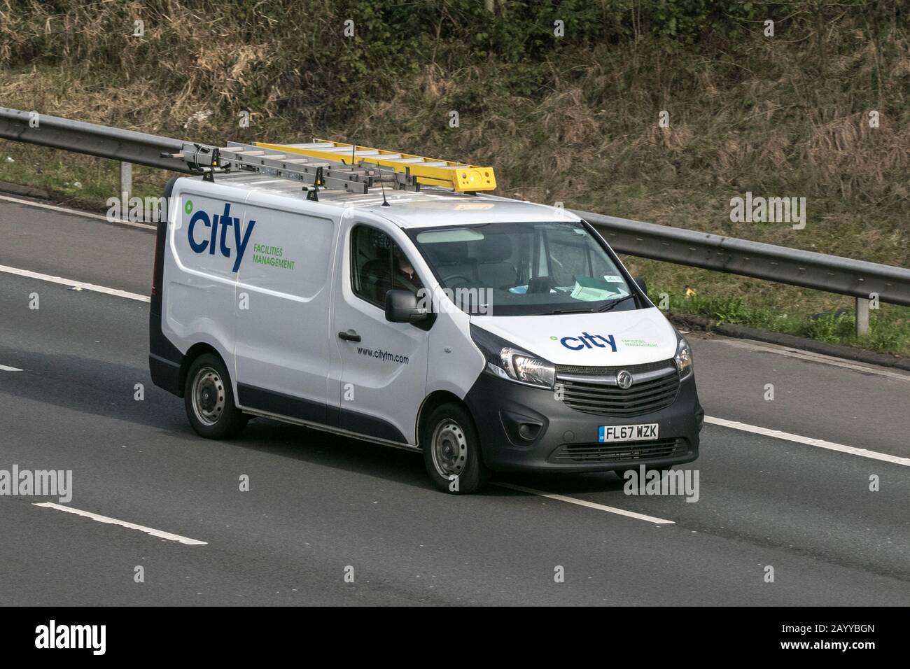 A City Facilities Management Vauxhall Vivaro panel van vehicle movement