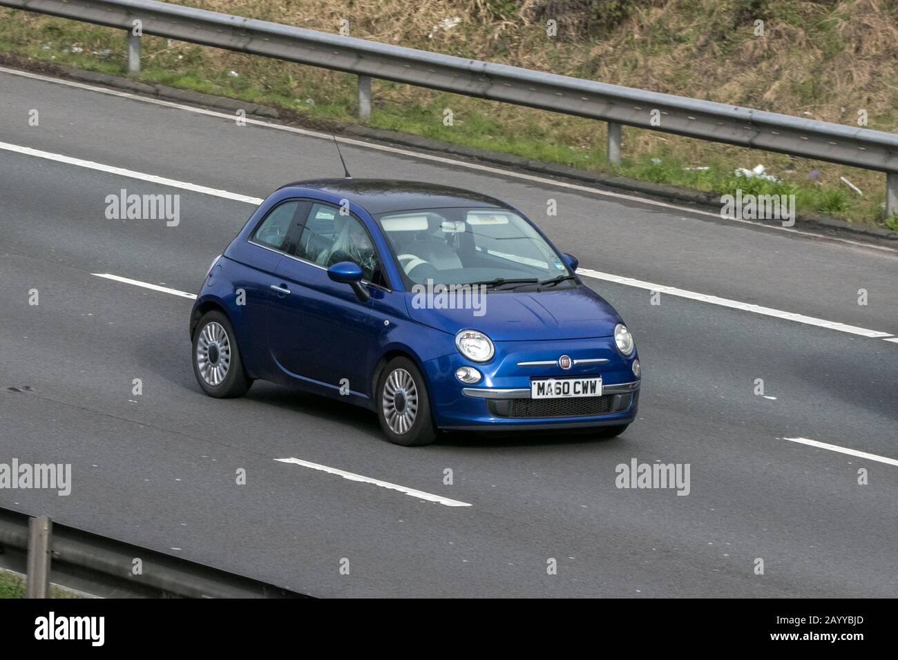 2010 Fiat 500 Lounge Multijet 95 Blue Car Diesel vehicle movement driving on the M6 motorway near Preston in Lancashire Stock Photo