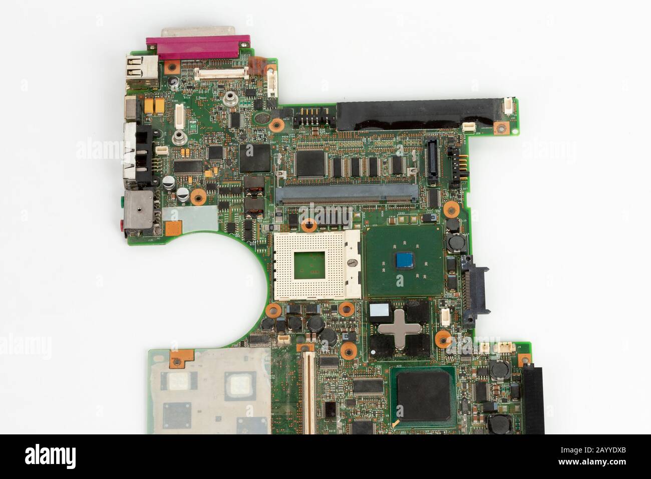 Laptop mother board with empty socket for CPU a integrated graphics card on white background. Stock Photo