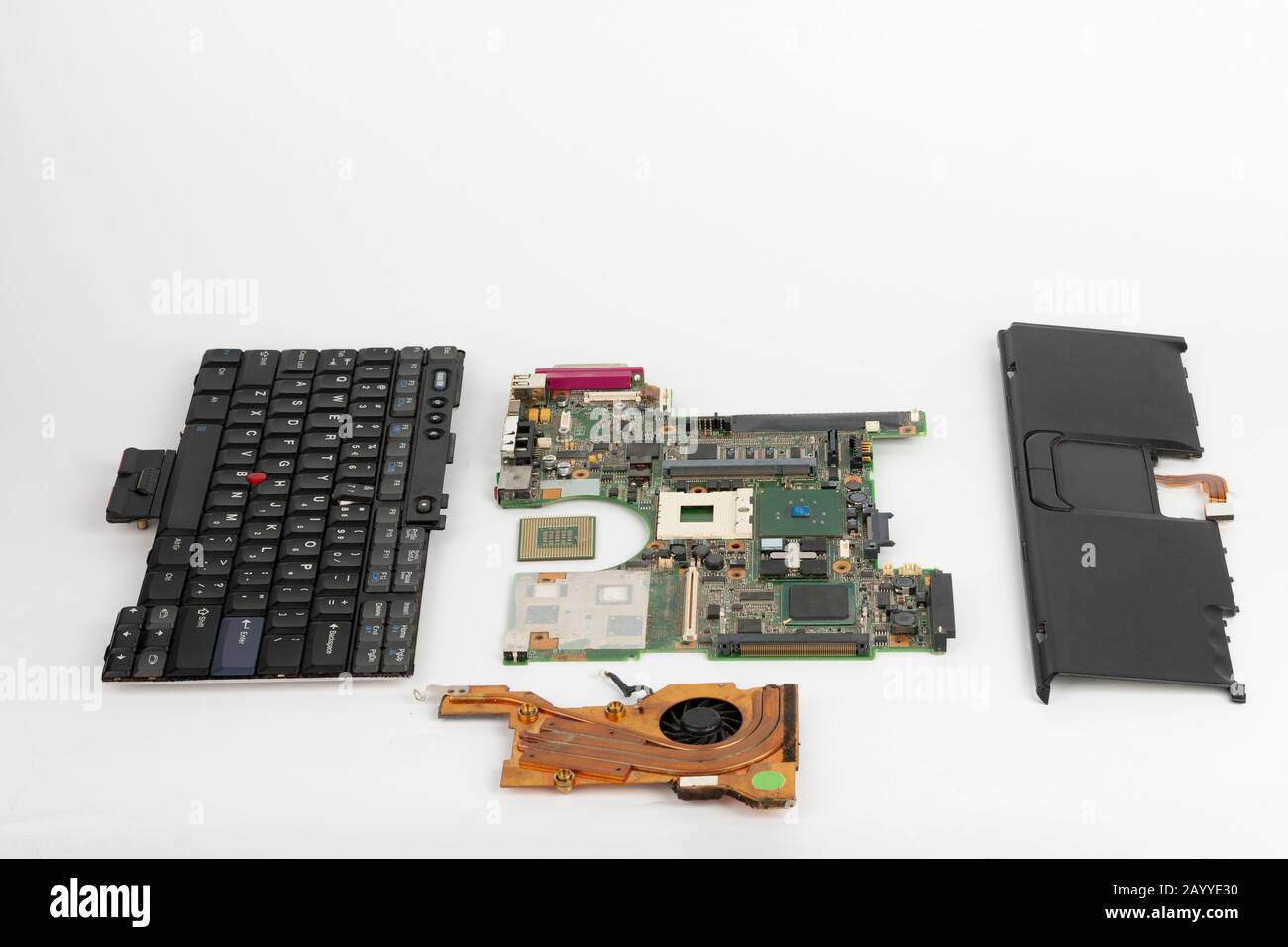 Disassembled laptop, basic components of notebook, keyboard, processor,  motherboard, touchpad , CPU fan Stock Photo - Alamy
