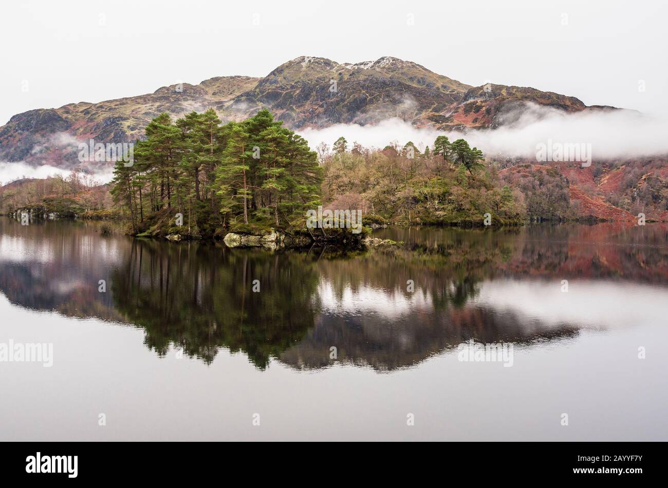 Sir Walter Scott is reflected in Loch Katrine in the trossachs. Stock Photo