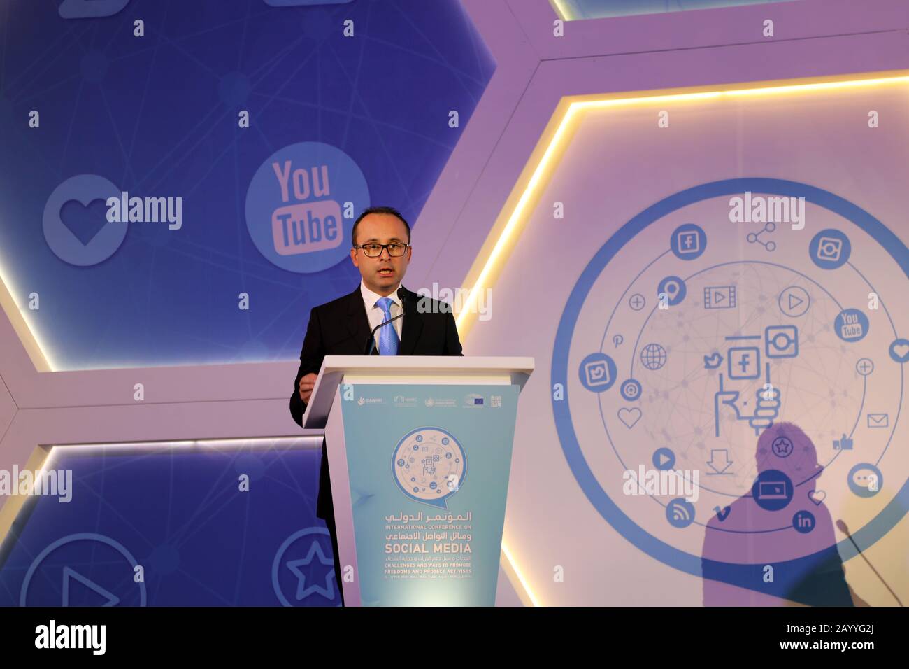 Doha / Qatar – February 17, 2020: Cristian Silviu Bușoi, Romanian member of the European Parliament, speaking at the International Conference on Social Media Stock Photo