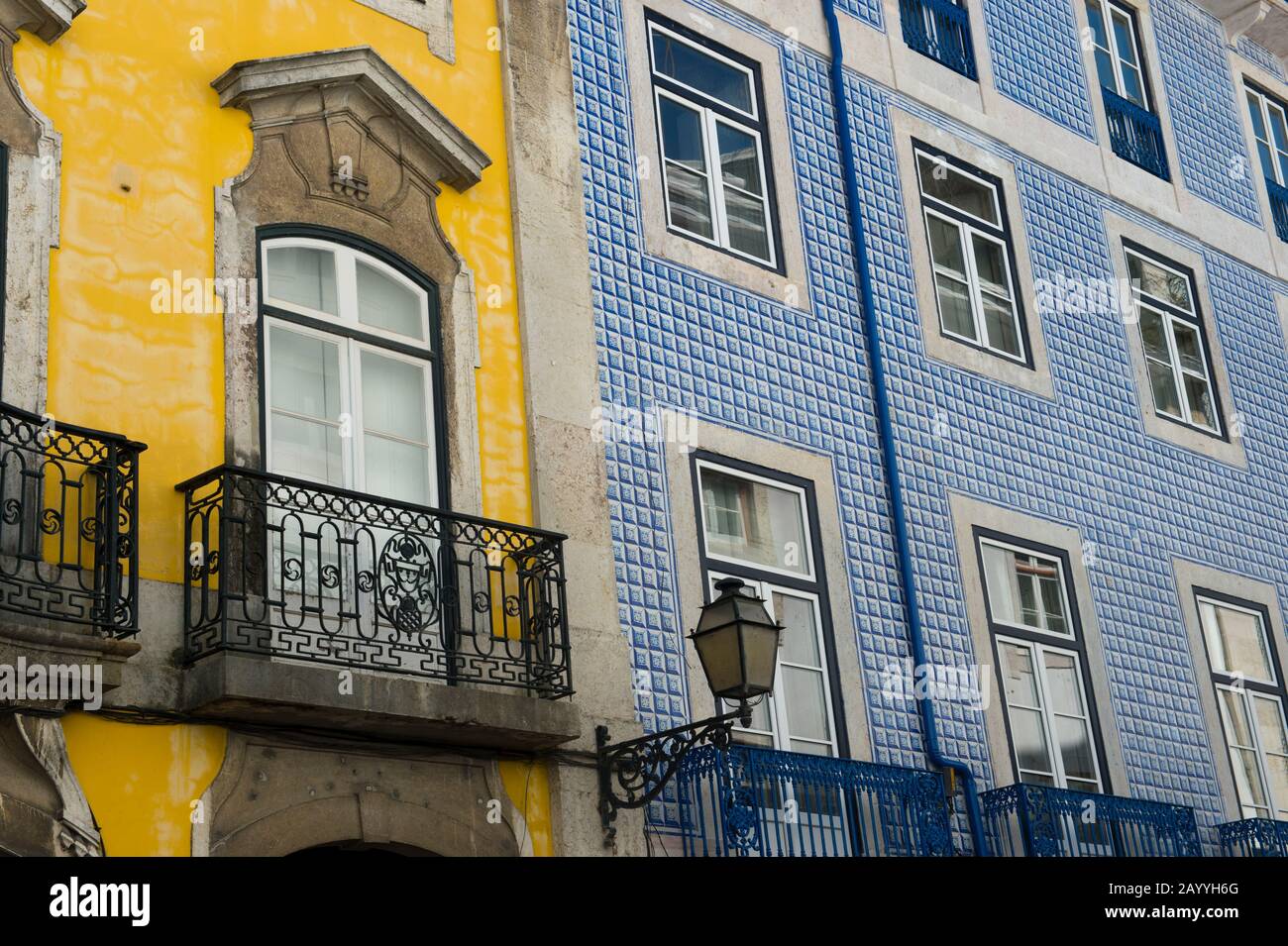 Street scene with a tiled house in the traditional Alfama, the old quarter of, Lisbon, the capital city of Portugal. Stock Photo