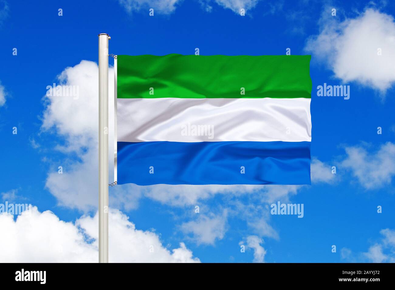 flag of Sierra Leone in front of blue cloudy sky, Sierra Leone Stock ...