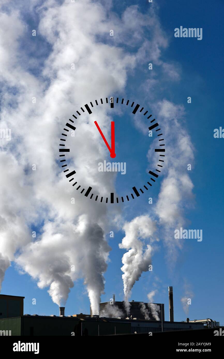 coal-fired power station, clock displaying 5 for 12, climate change, composing, Austria, Vienna Stock Photo