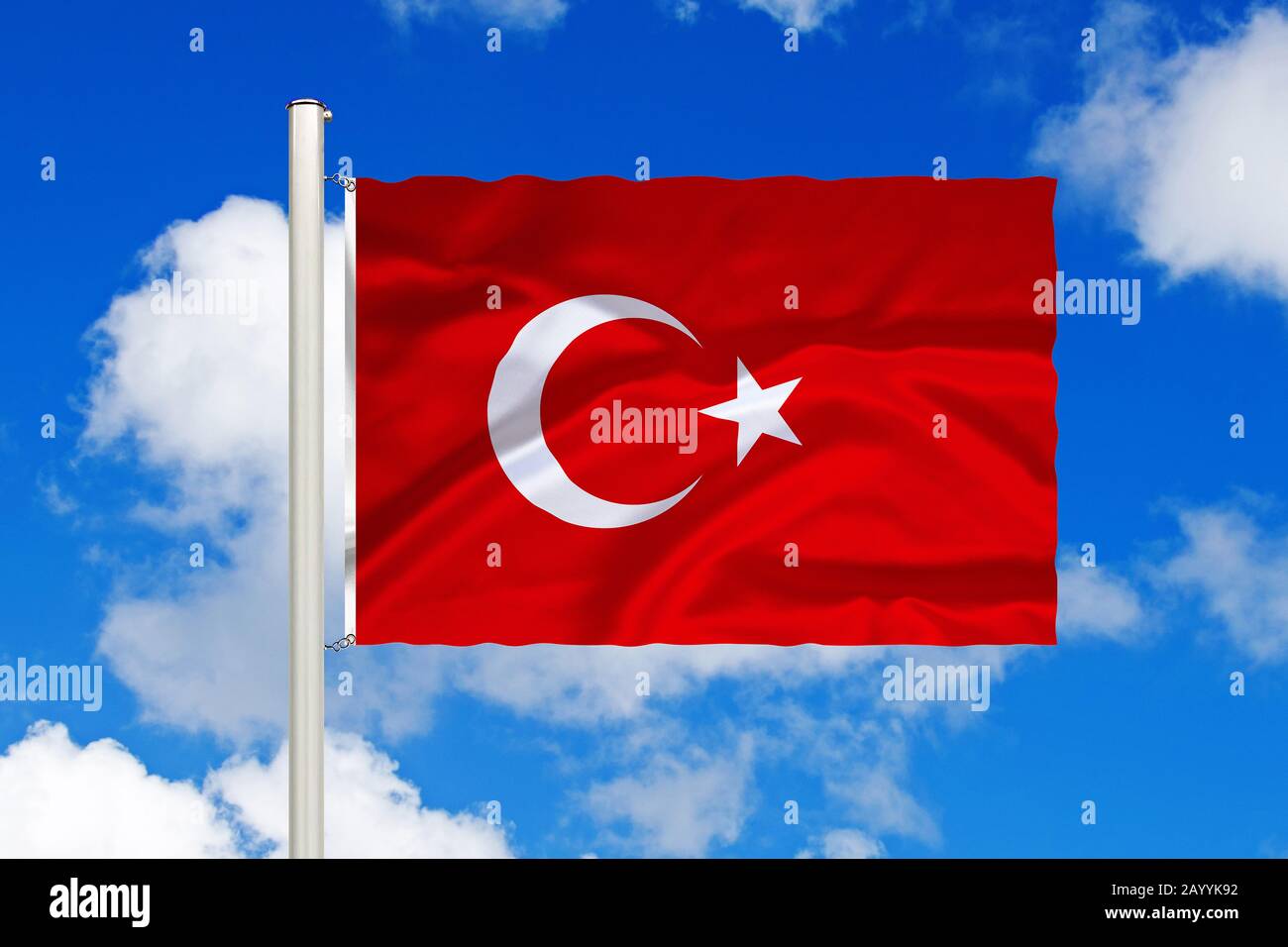 flag of Turkey in front of blue cloudy sky, Turkey Stock Photo