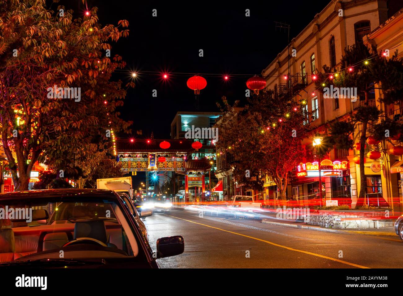 Victoria British Columbia Canada October 24 2012: China town at night with light streaks and gate in the background Stock Photo