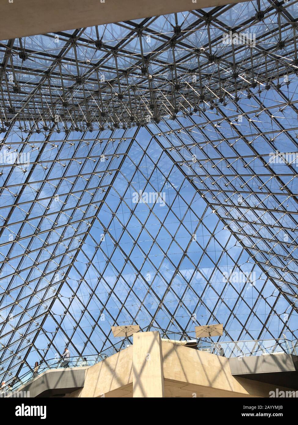 Paris, France - 05.24.2019: Inside view of famous Louvre Museum with Louvre Pyramid. Stock Photo