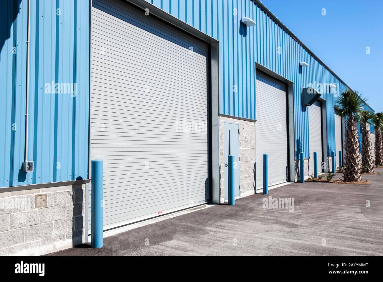 Ground level view of warehouse with roller shutter exterior doors Stock Photo