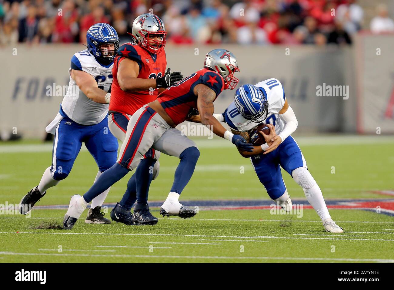 Houston, Texas, USA. 16th Feb, 2020. Houston Roughnecks linebacker DeMarquis  Gates (47) tackles St. Louis Battlehawks quarterback Jordan Ta'amu (10)  during the XFL regular season game at TDECU Stadium in Houston, TX