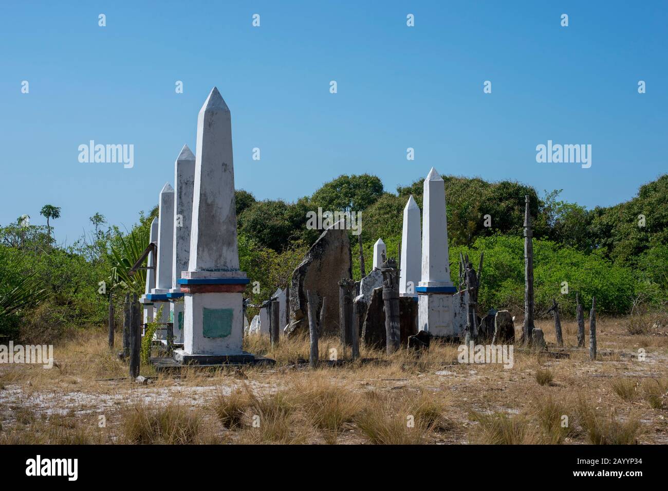 Antanosy cemetary with obelisks and wood sculptures as memorials for the dead near Fort Dauphin (Taolagnaro), a town on the southern coast of Madagasc Stock Photo