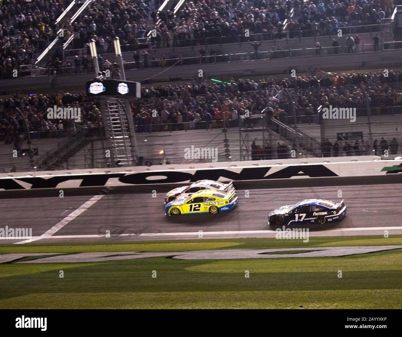 Daytona, United States. 17th Feb, 2020. Denny Hamlin (top) edges Ryan Blaney (12) to win the 62nd Daytona 500, on Monday, February 17, 2020 in Daytona, Florida. Photo by Edwin Locke/UPI Credit: UPI/Alamy Live News Stock Photo