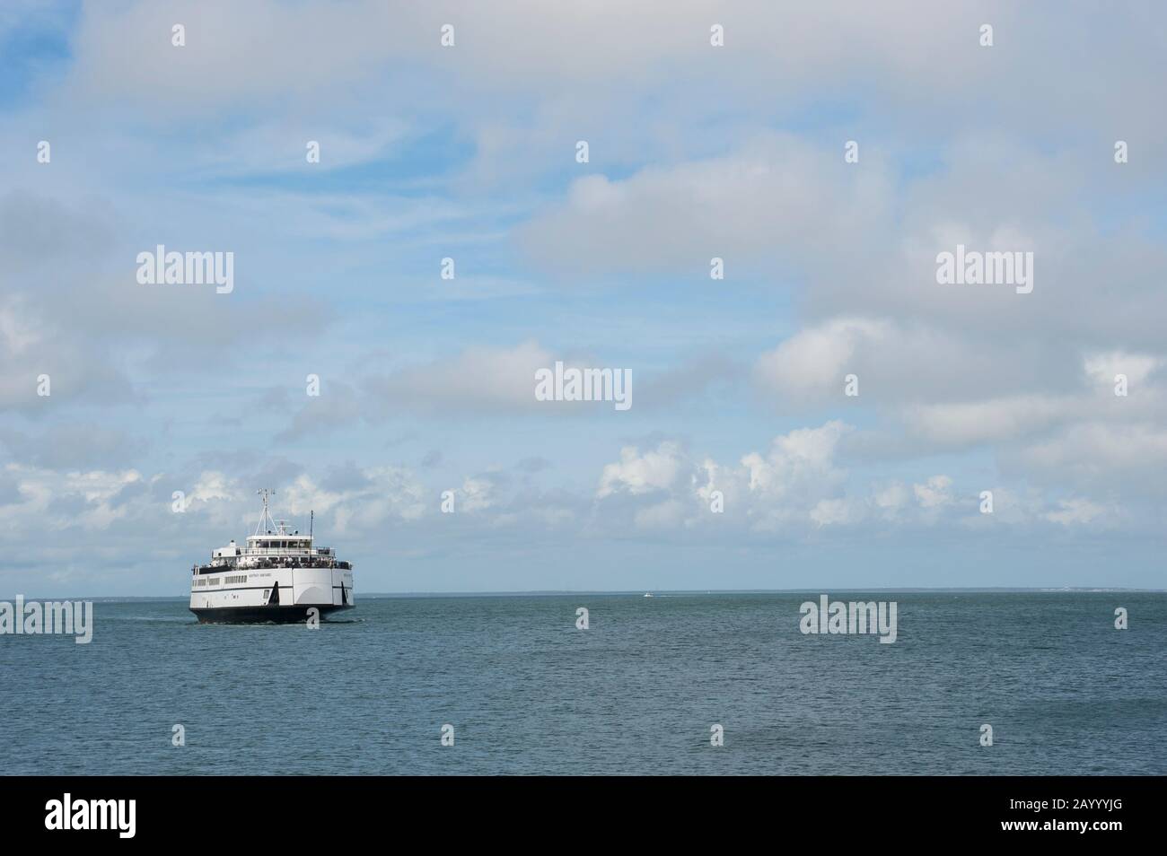 The ferry to Woods Hole is coming into the ferry terminal in Oak Bluffs
