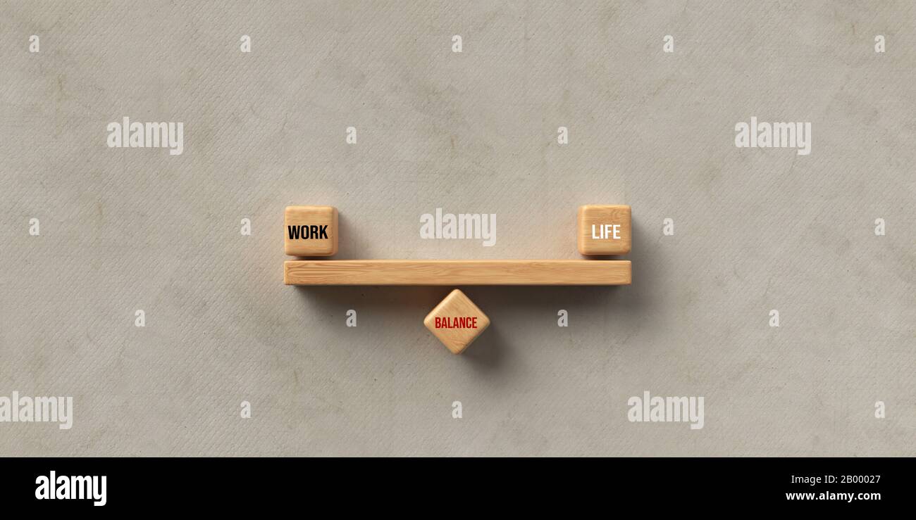 wooden blocks formed as a seesaw with the words WORK, LIFE and BALANCE ...