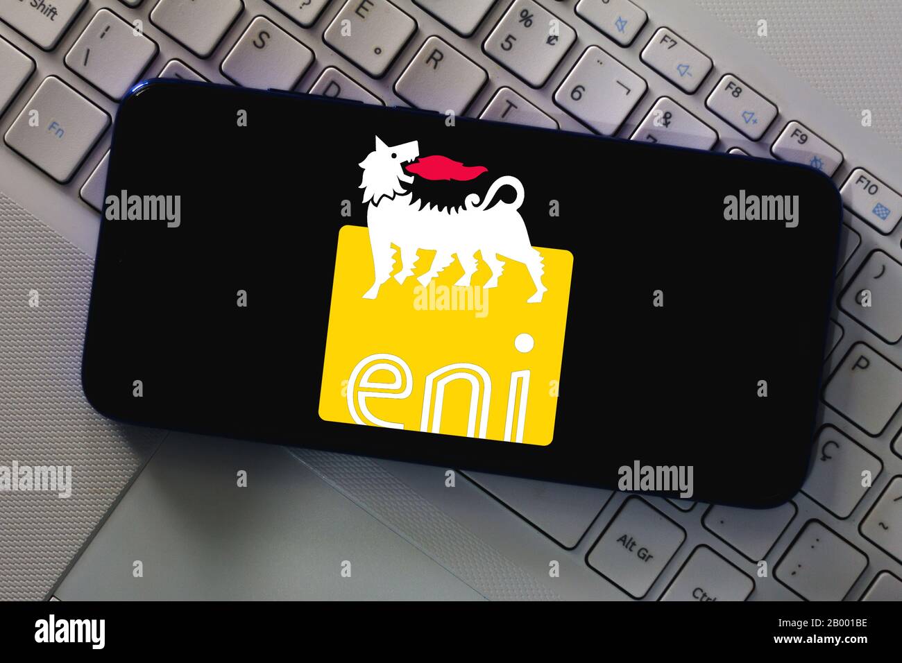 In this photo illustration the Ente Nazionale Idrocarburi (ENI) logo seen displayed on a smartphone. Stock Photo