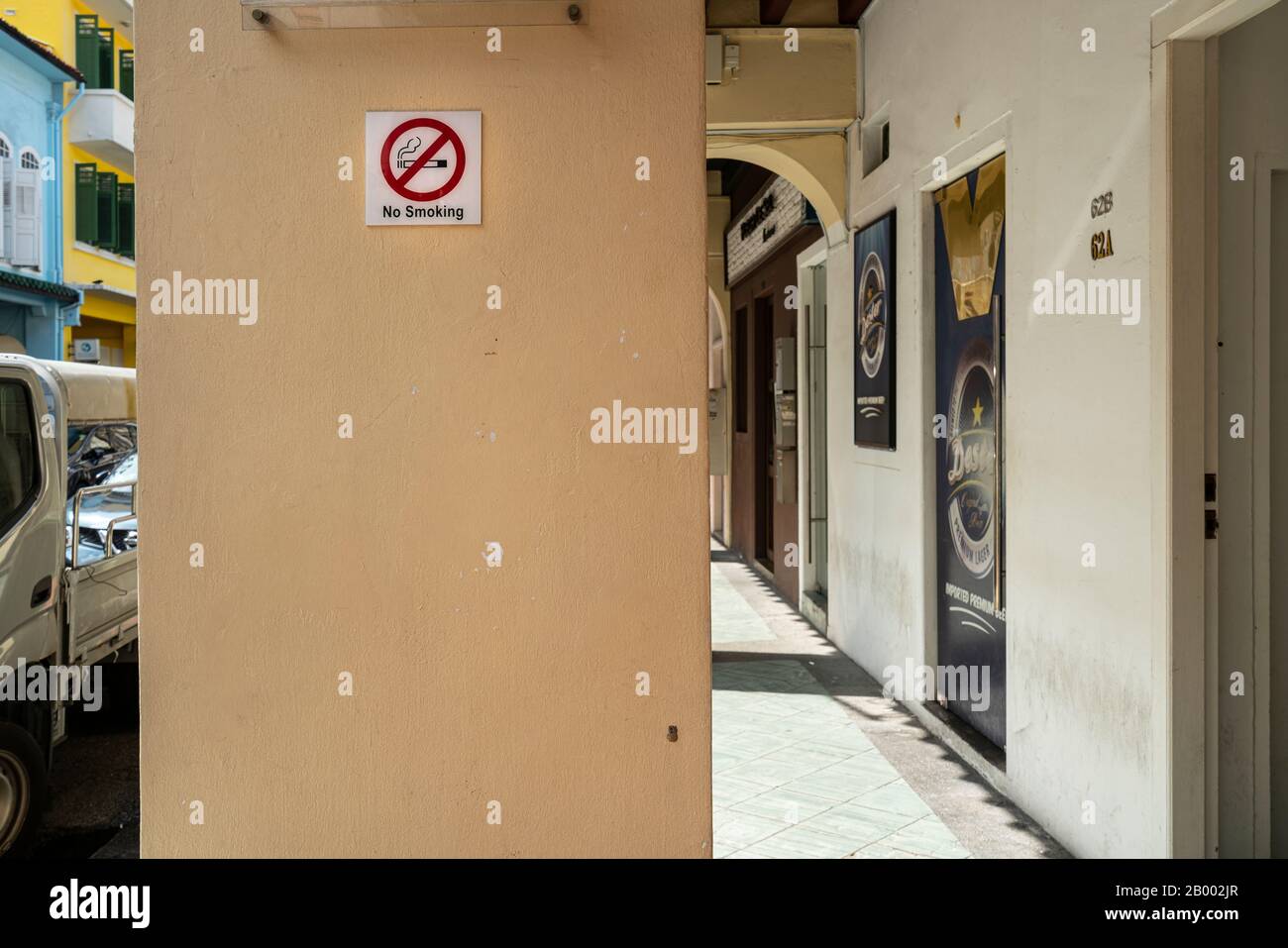 Singapore.  January 2020.  the No Smoking sign on a column in the street Stock Photo
