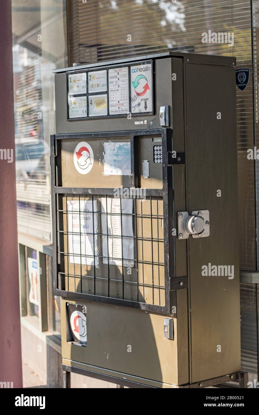 A free and anonymous needles, syringes and sharps goods dispensing machine in the Melbourne suburb of Fitzroy in Australia Stock Photo