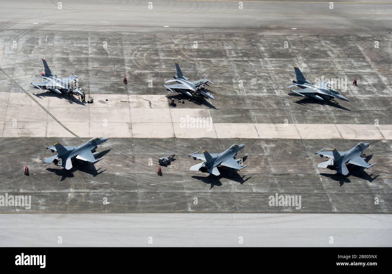 U.S. Air Force F-16 Fighting Falcons assigned to the 14th Fighter Squadron, Misawa Air Base, Japan, are staged on the flight line in preparation for Exercise Cope North 20 at Andersen Air Force Base, Guam, Feb. 12, 2020. Cope North 20 is an annual trilateral field training exercise conducted at Andersen AFB, Guam, and around the Commonwealth of the Northern Mariana Islands (CNMI), Palau and Yap in the Federated States of Micronesia.  (U.S. Air Force photo by Senior Airman Gracie Lee) Stock Photo