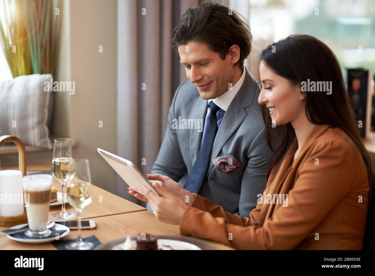 Business people Having Meeting In Cafe Stock Photo
