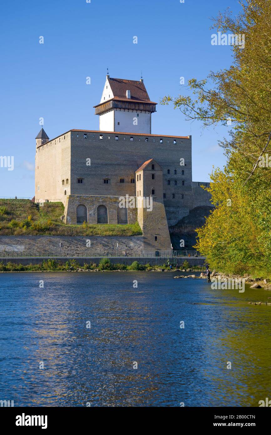 Herman Castle over the Narva River on a sunny September day. Estonia Stock Photo