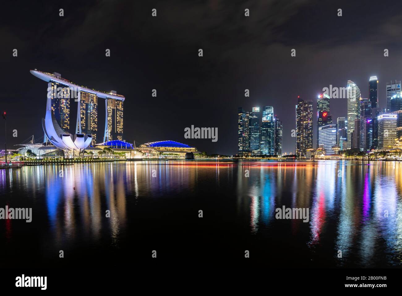 Marina Bay Sands Hotel, ArtScience Museum and skyline at night, Financial District, Banking District, Marina Bay, Downtown Core, Singapore Stock Photo