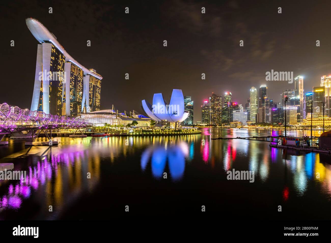 Marina Bay Sands Hotel, ArtScience Museum and skyline at night, Financial District, Banking District, Marina Bay, Downtown Core, Singapore Stock Photo