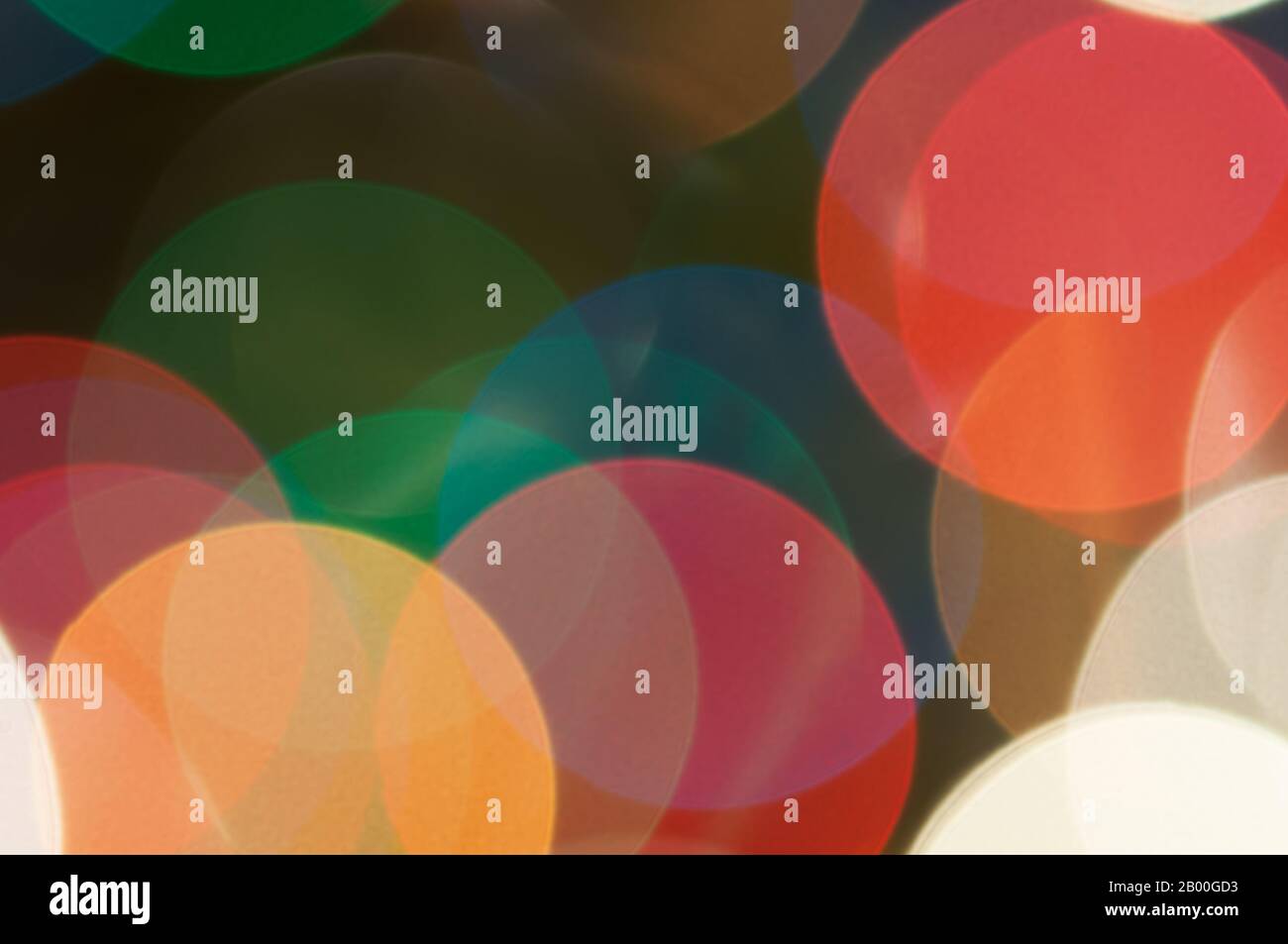 Colourful festive multi-colored circles . Defocused abstract multicolored bokeh lights background Stock Photo