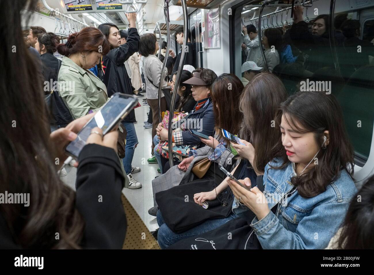 South Korea, Seoul passengers in a subway train Stock Photo Alamy