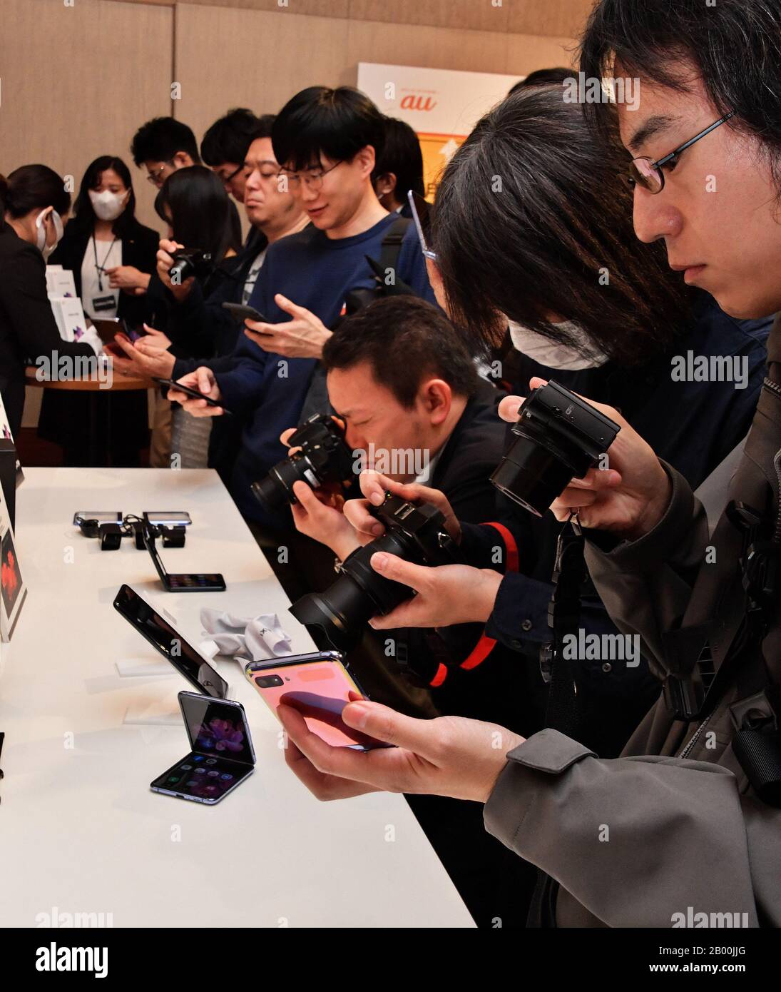 Journalist try out Samsung Galaxy Z Flip during the press conference
