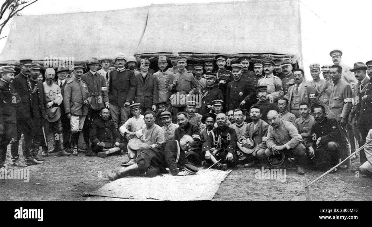 China: Japanese General Kuroki and his staff, foreign officers and war correspondents after the Battle of Shaho, (Russo-Japanese War, 8 February 1904 – 5 September 1905).  The Russo-Japanese War (8 February 1904 – 5 September 1905) was the first great war of the 20th century which grew out of the rival imperial ambitions of the Russian Empire and Japanese Empire over Manchuria and Korea. The resulting campaigns, in which the Japanese military attained victory over the Russian forces arrayed against them, were unexpected. Stock Photo
