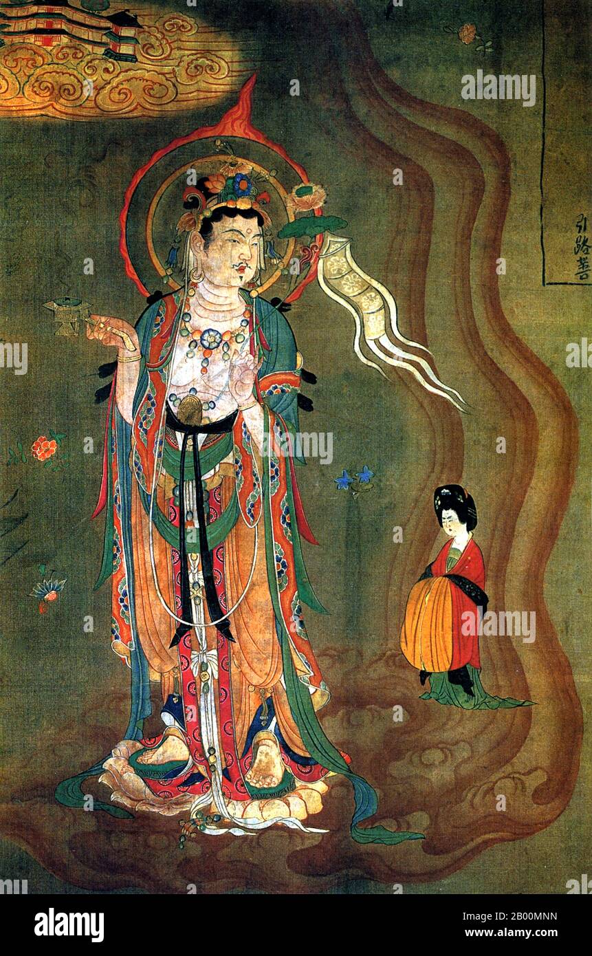 China: A Bodhisattva showing a female donor the way to the hereafter, Mogao Caves, Gansu.  The Mogao Caves, or Mogao Grottoes (Chinese: mò gāo kū), also known as the Caves of the Thousand Buddhas and Dunhuang Caves, form a system of 492 temples 25 km (15.5 miles) southeast of the center of Dunhuang, an oasis strategically located at a religious and cultural crossroads on the Silk Road, in Gansu province, China. Stock Photo