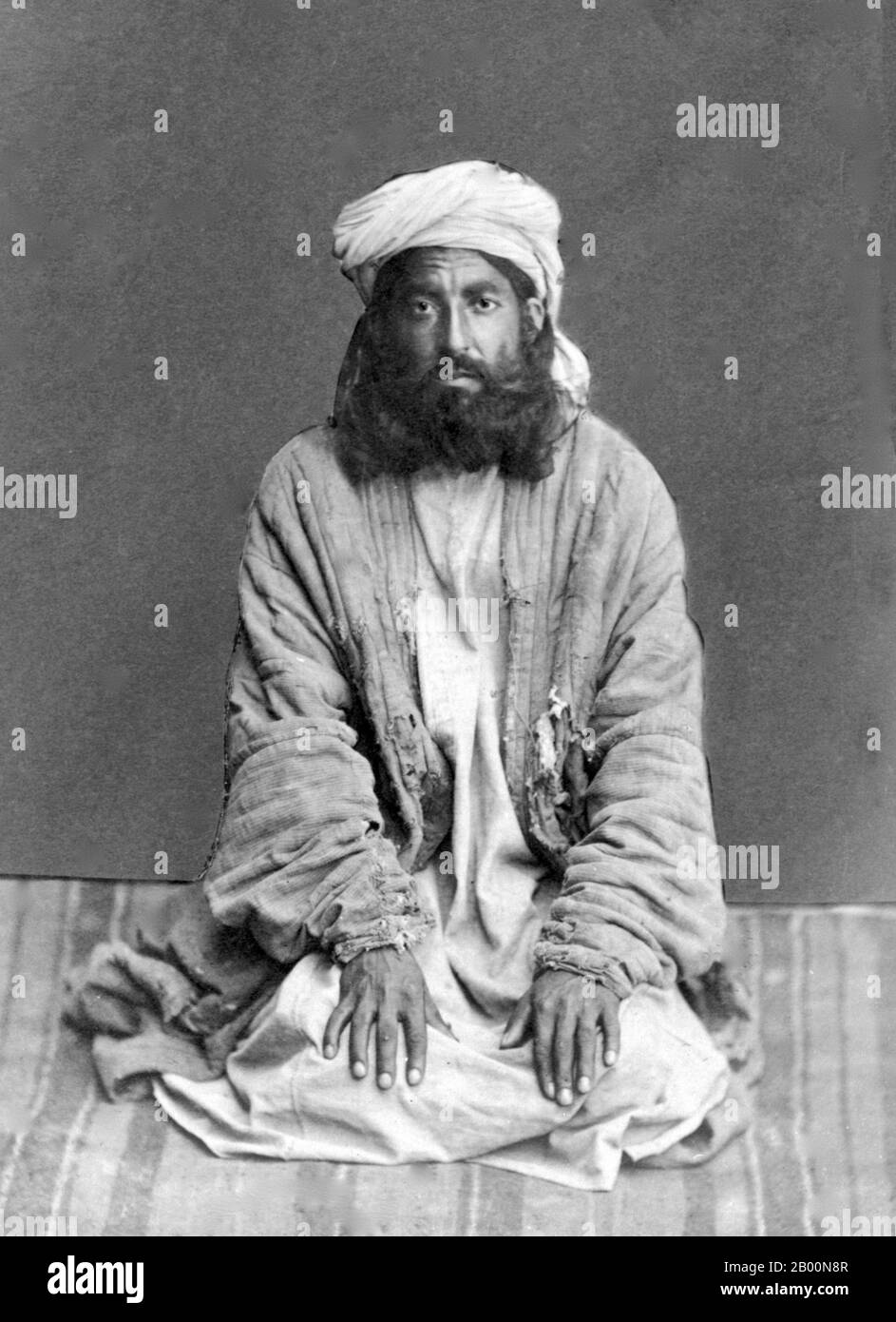 Afghanistan: Pashtun man, late 19th century.  Pashtuns, also called Pathans, are an Eastern Iranian ethno-linguistic group with populations primarily in Afghanistan and northwestern Pakistan, which includes Khyber-Pakhtunkhwa, Federally Administered Tribal Areas (FATA) and Balochistan. The Pashtuns are typically characterized by their usage of the Pashto language and practice of Pashtunwali, a traditional set of ethics guiding individual and communal conduct. Stock Photo