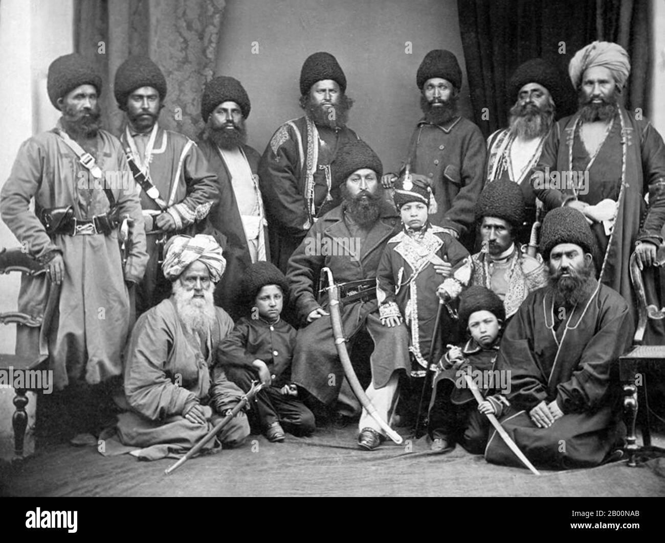 Afghanistan: 'Group of the Amir Shere Ali, Prince Abdullah Jan, & Sirdars'. Photo by John Burke (1843-1900), 1869.  Sher Ali Khan (1825–February 21, 1879) was Amir of Afghanistan from 1863 to 1866 and from 1868 until his death in 1879. He was the third son of Dost Mohammed Khan, founder of the Barakzai Dynasty in Afghanistan. Stock Photo