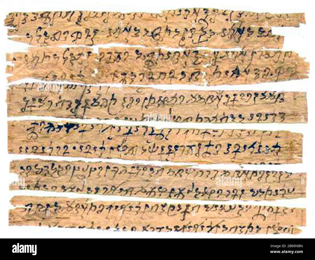 India: Gandharan script. Buddhist text, 1st-2nd century CE.  The Gandharan Buddhist texts are both the earliest Buddhist and South Asian manuscripts discovered so far. Most are written on birch bark and were found in labeled clay pots. Panini has mentioned both the Vedic form of Sanskrit as well as what seems to be Gandhari, a later form of Sanskrit, in his Ashtadhyayi.  Gandhara's language was a Prakrit or 'Middle Indo-Aryan' dialect, usually called Gāndhārī. Texts are written right-to-left in the Kharoṣṭhī script, which had been adapted for Indo-Aryan languages from the Aramaic Alphabet. Stock Photo