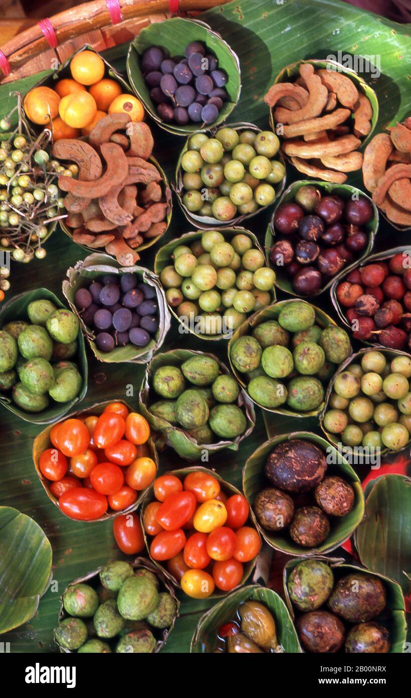 Thailand: A colourful display of fruit at a traditional northern market, Chiang Mai, northern Thailand.  Chiang Mai, Thailand’s ‘Rose of the North’, is the country’s second city and a popular tourist destination due primarily to its mountainous scenery, colourful ethnic hilltibes and their handicrafts.  Founded in 1296 by King Mengrai as the capital of his Lanna kingdom, Chiang Mai was later overrun by Burmese invaders in 1767. The city was then left abandoned between 1776 and 1791. Chiang Mai formally became part of Siam in 1774 by an agreement with local prince Chao Kavila. Stock Photo