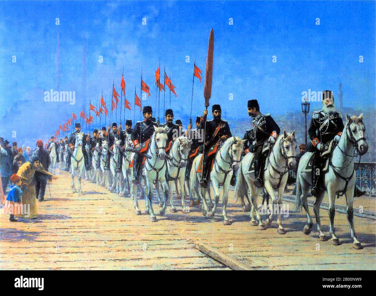 Turkey/Italy: 'The Ertugrul Cavalry Regiment crossing the Galata Bridge'. Painting by Fausto Zonaro (1854-1929), 1901.  The Ottoman Empire's power and prestige peaked in the 16th and 17th centuries, particularly during the reign of Suleiman the Magnificent. The empire was often at odds with the Holy Roman Empire in its steady advance towards Central Europe through the Balkans and the southern part of the Polish-Lithuanian Commonwealth. At sea, the empire contended with the Holy Leagues, composed of Habsburg Spain, the Republic of Venice and the Knights of St. John, to control the Mediterranean Stock Photo
