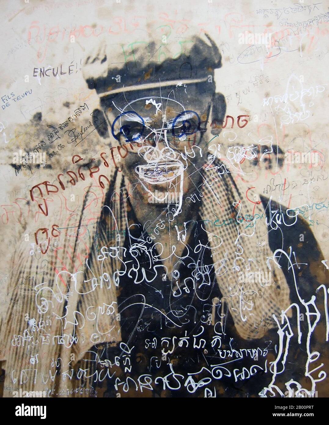 Cambodia: A photograph of Son Sen, Defense Minister of Democratic Kampuchea, defaced by Khmer graffiti.  Son Sen (June 12, 1930 – June 10, 1997), member of the Central Committee of the Communist Party of Kampuchea, aka the Khmer Rouge, from 1974 to 1992, Sen oversaw the Party's security apparatus, including the Santebal secret police and the notorious security prison S-21 at Tuol Sleng. Son Sen was married to Yun Yat, who became the Party's Minister of Education and Information. Along with the rest of his family, he was killed on the orders of Pol Pot during a 1997 factional split. Stock Photo
