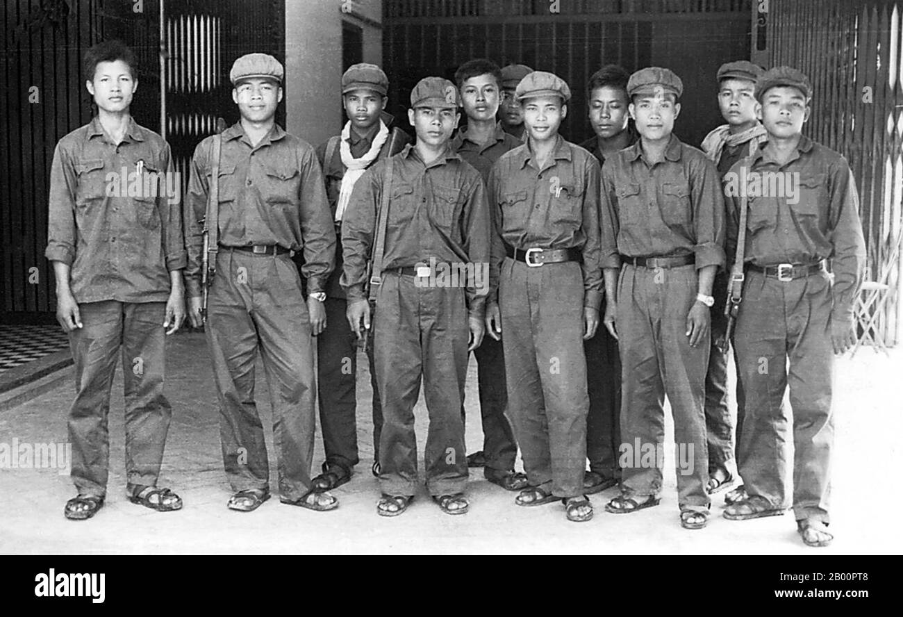 Cambodia: Tuol Sleng (S 21) Prison: A group of young Khmer Rouge prison guards, c.1977. Altough permanently in danger of arrest themselves, these guards were privileged by DK standards - note the good quality uniforms, wrist watches and pens in top pockets, the latter indicative of senior rank. ARchival photo from Tuol Sleng Genocide Museum. Stock Photo