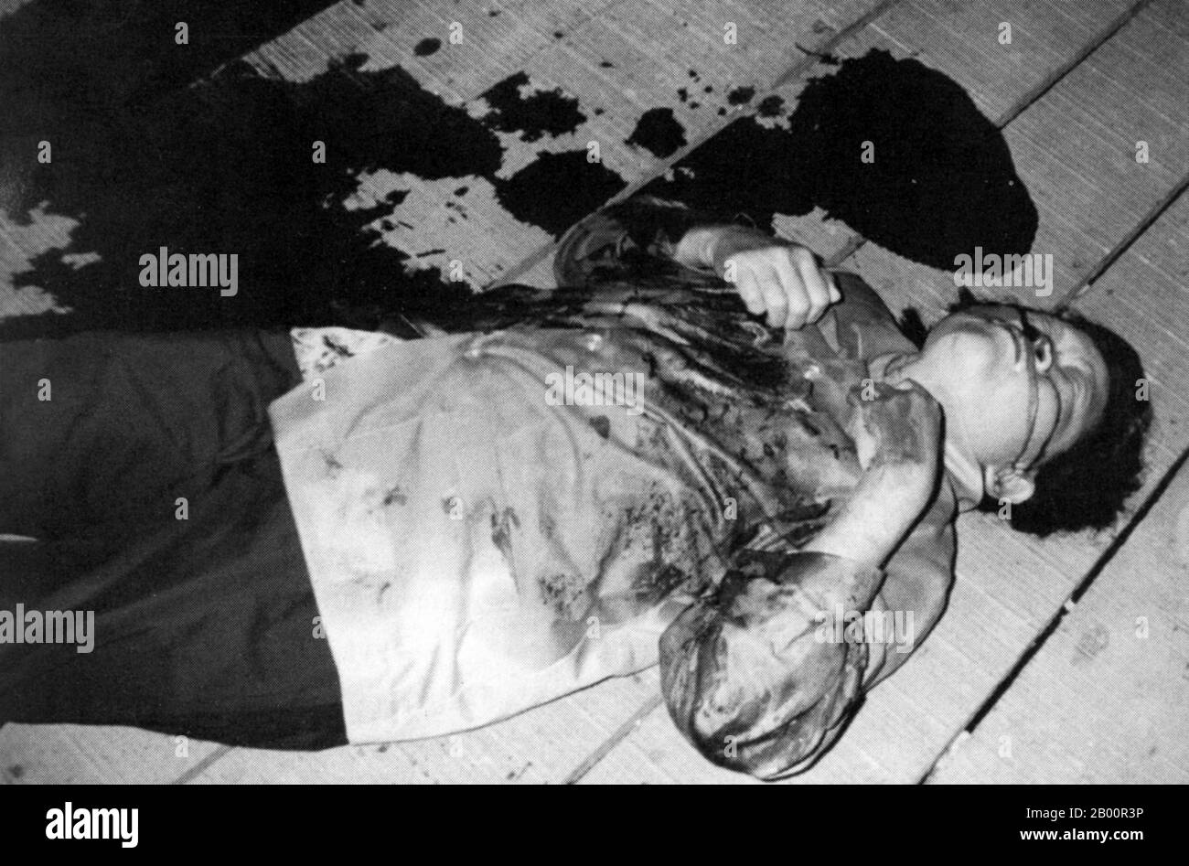 Cambodia: The body of Yun Yat, former DK Information Minister, after her murder/execution at Anlong Veng, June 15, 1997.  Yun Yat, alias Comrade At, was the wife of Son Sen, Defence Minister of Democratic Kampuchea. On October 9, 1975, the Standing Committee of Communist Party of Kampuchea placed her in charge of information and education. In 1977, she was appointed as Information Minister. On June 10, 1997 Khieu Samphan declared that Yun Yat and Son Sen had been arrested as spies of Hun Sen and Vietnam, and declared as traitors. Yun Yat, Son Sen and eight relatives were subsequently executed. Stock Photo
