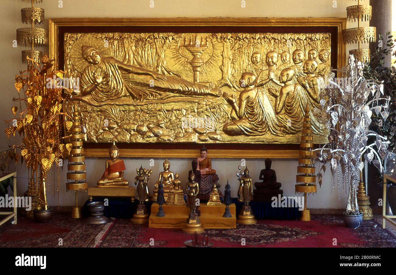 Cambodia: Gold Buddha bas-relief, Royal Palace and Silver Pagoda, Phnom Penh.  The Royal Palace (Preah Barum Reacha Veang Nei Preah Reacheanachak Kampuchea) and Silver Pagoda, in Phnom Penh, is a complex of buildings which serves as the royal residence of the king of Cambodia. Its full name in the Khmer language is Preah Barom Reachea Veang Chaktomuk. The Kings of Cambodia have occupied it since it was built in the 1860's, with a period of absence when the country came into turmoil during and after the reign of the Khmer Rouge. Stock Photo