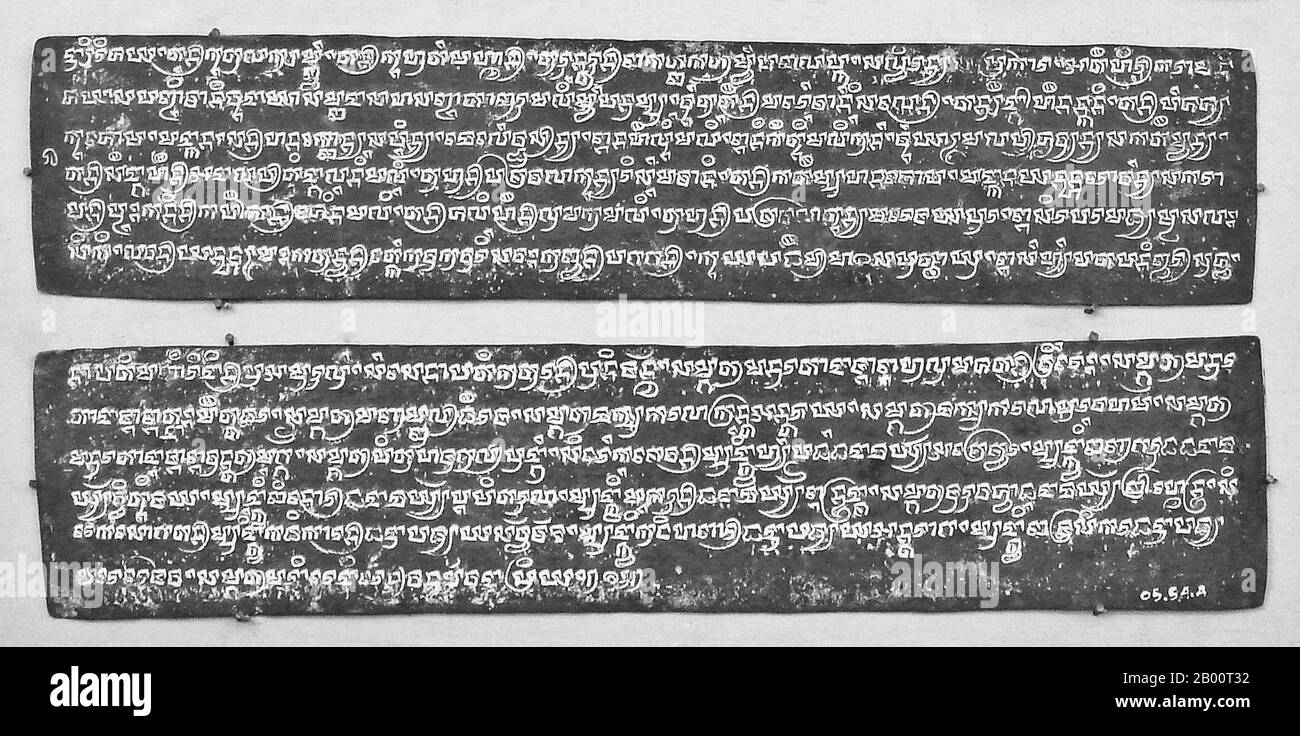 Indonesia: Balinese copper plate grant inscribed with Balinese letters.  Balinese is an Austronesian language spoken by about three million people on the Indonesian island of Bali. However, Balinese script has largely been replaced by the Roman alphabet in modern times. Although it is learned in school, few people use it. It is mostly used in temples and for religious writings.  The Balinese script was derived from the Old Kawi alphabet, which ultimately derived from the Brahmi alphabet, the root of all the Indic and Southeast Asian abugidas. The alphabet consists of 47 characters. Stock Photo