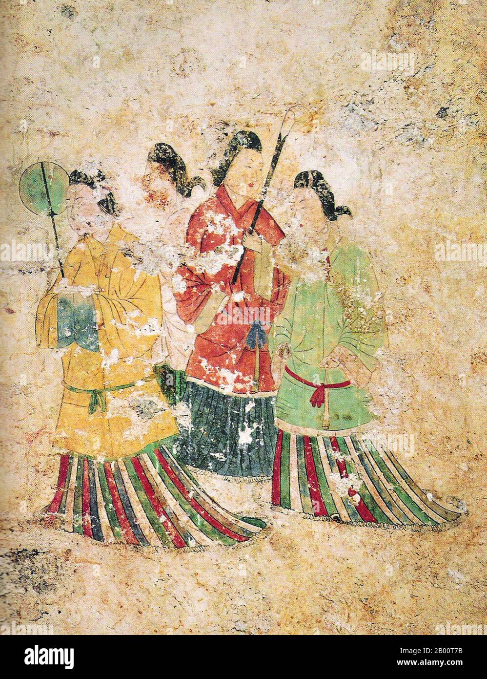 Japan: The 'Asuka Bijin' or 'Beautiful women of the Asuka Period', Takamatsuzuka Tomb, 6th-7th century CE.  The Takamatsuzuka Tomb (Takamatsuzuka Kofun or 'Tall Pine Tree Ancient Burial Mound' is an ancient circular tomb in Asuka village, Nara prefecture, Japan. Dating from the 6th-7th century CE, it contains painted fresco wall paintings of courtiers in Goguryeo-style garb.  The paintings are in full color with red, blue, gold, and silver foil representing four male followers and four abigails together with the Azure Dragon, Black Tortoise, White Tiger, and Vermilion Bird groups of stars. Stock Photo