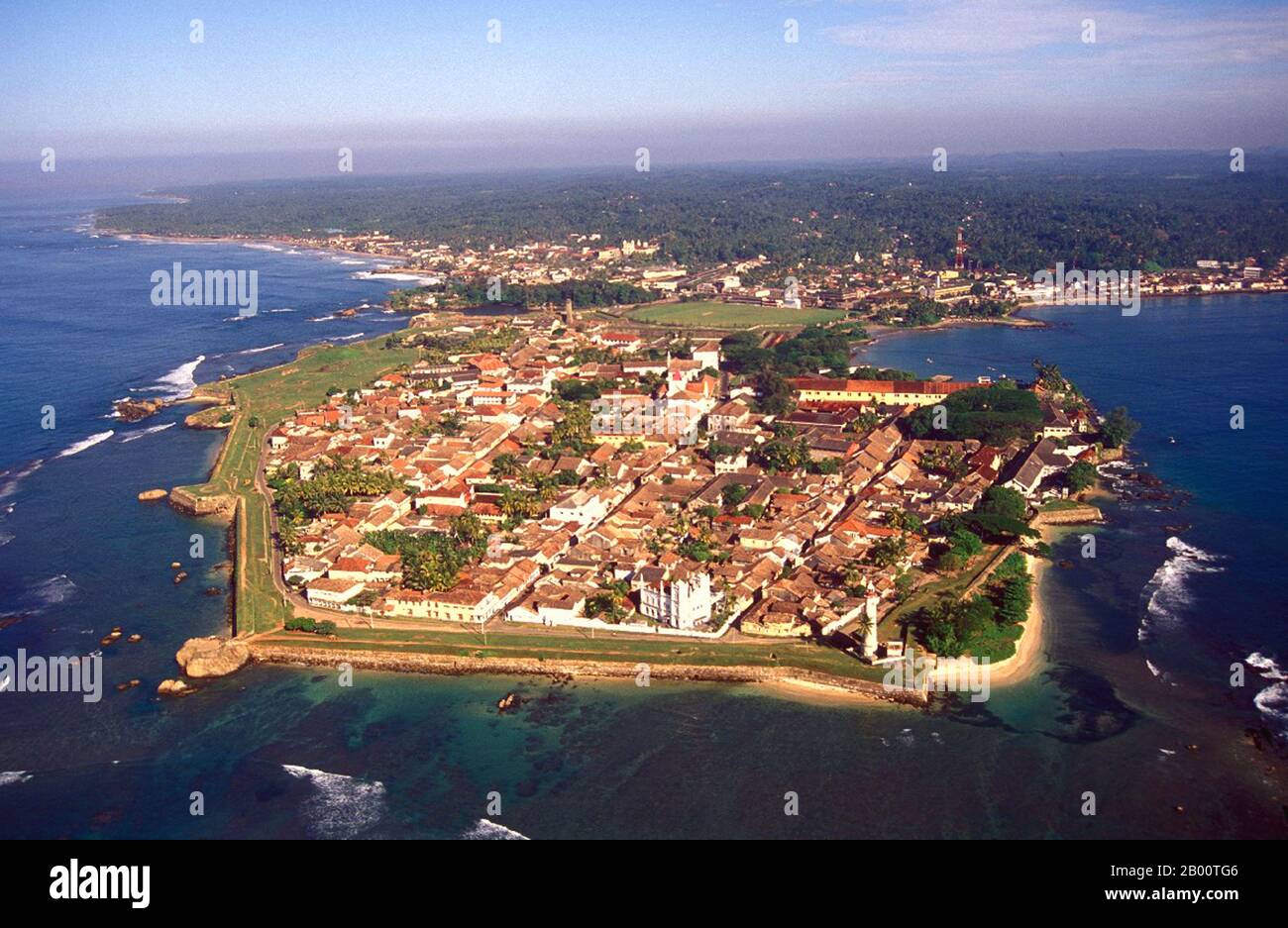 Sri Lanka: Galle Fort and peninsula from the air. This image has been released into the public domain.  Sri Lanka had always been an important port and trading post in the ancient world, and was increasingly frequented by merchant ships from the Middle East, Persia, Burma, Thailand, Malaysia, Indonesia and other parts of Southeast Asia. The islands were known to the first European explorers of South Asia and settled by many groups of Arab and Malay merchants. Stock Photo