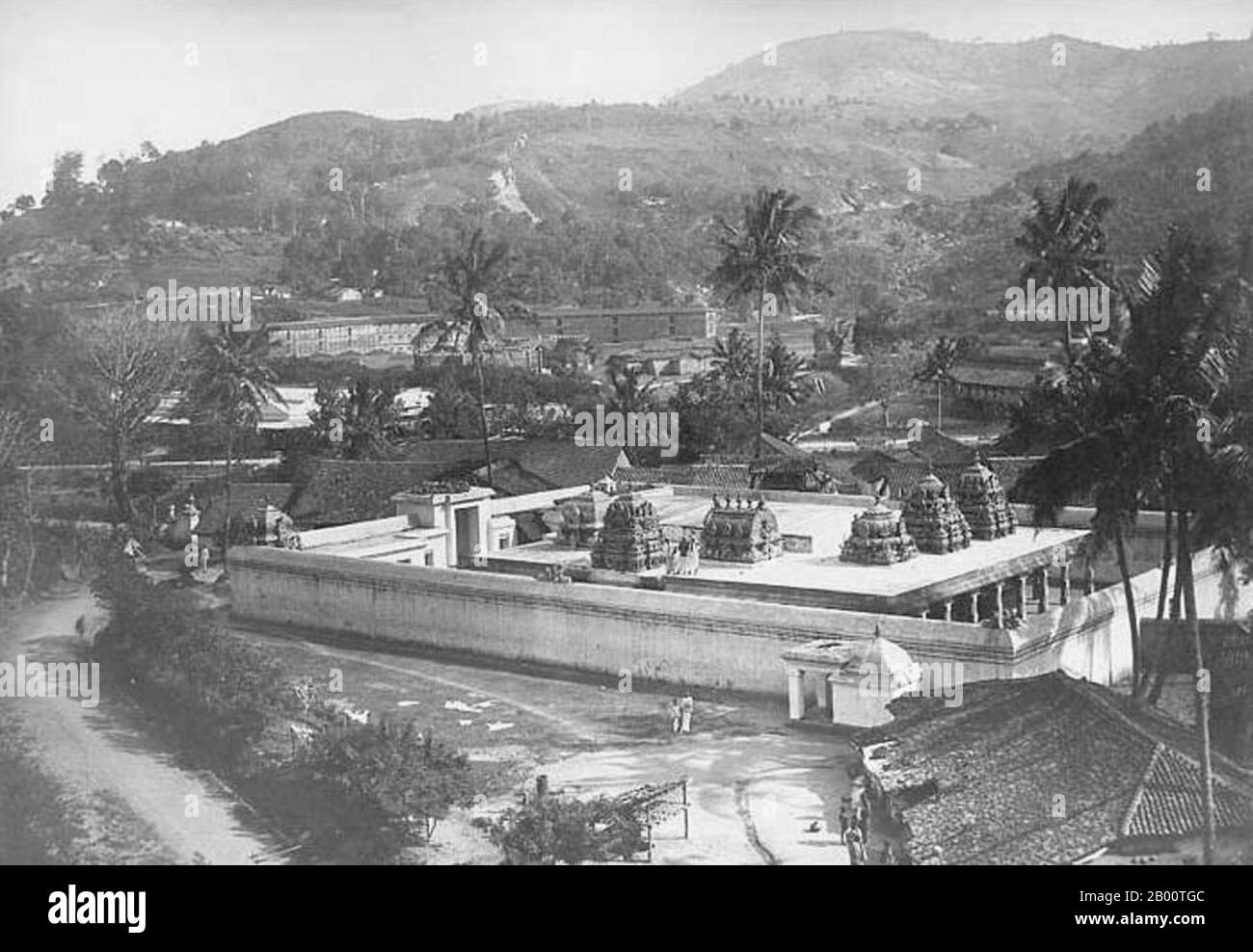 Sri Lanka: A Hindu temple in Kandy, c. 1880.  In 1592 Kandy became the capital city of the last remaining independent kingdom in Sri Lanka after the coastal regions had been conquered by the Portuguese.  Kandy stayed independent until the early 19th century. In the Second Kandyan War, the British met no resistance and reached the city on February 10, 1815. On March 2, 1815, a treaty known as the Kandyan Convention was signed between the British and the Radalas (Kandyan aristocrats). With this treaty, Kandy recognized the King of England as its King and became a British protectorate. Stock Photo