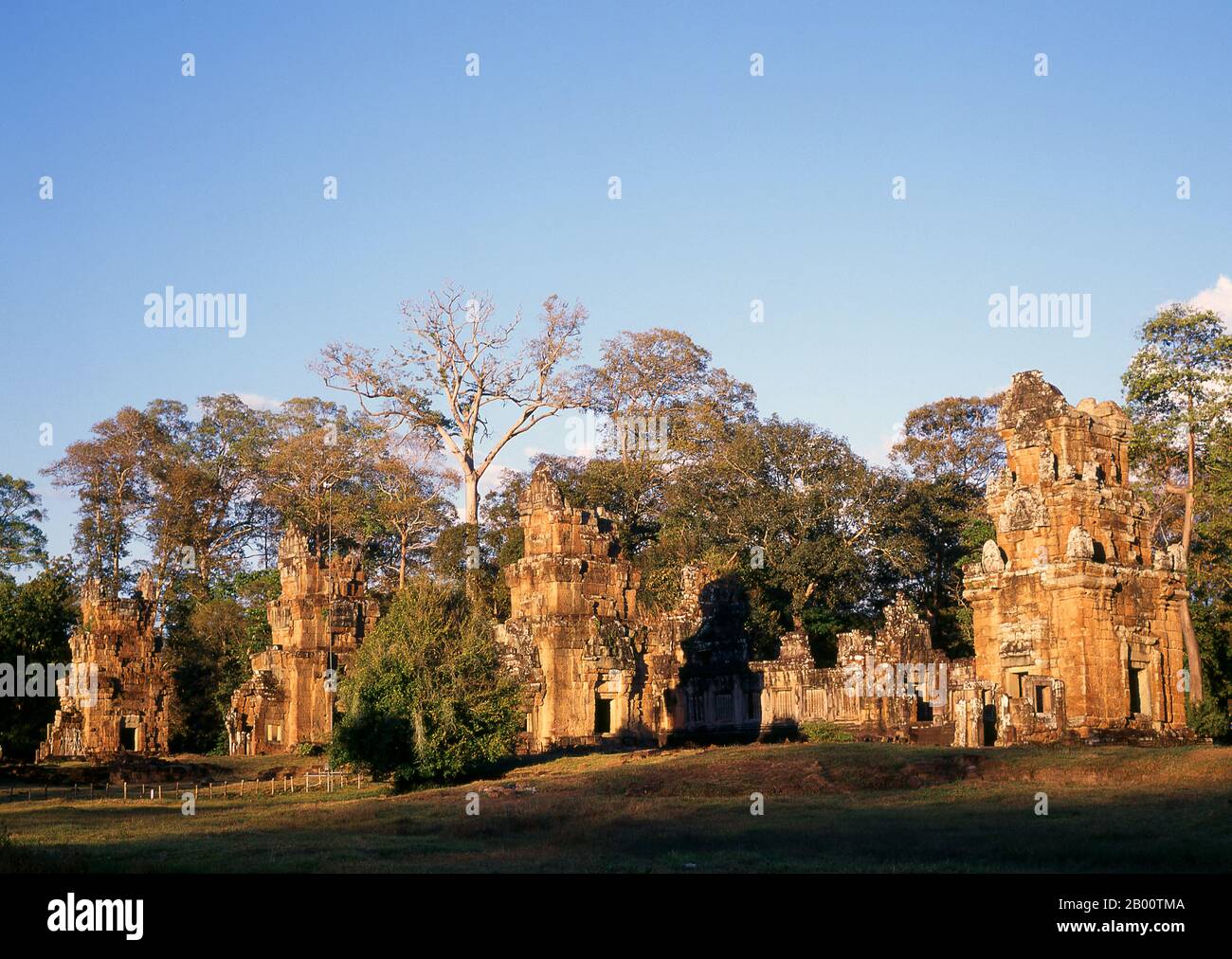 Cambodia: Suor Prat Towers at sunset, Angkor Thom.  Suor Prat Towers or 'Towers of the Rope Dancers' were built in the early 13th century.  Angkor Thom, meaning ‘The Great City’, is located one mile north of Angkor Wat. It was built in the late 12th century CE by King Jayavarman VII, and covers an area of 9 km², within which are located several monuments from earlier eras as well as those established by Jayavarman and his successors. It is believed to have sustained a population of 80,000-150,000 people. At the centre of the city is Jayavarman's state temple, the Bayon. Stock Photo