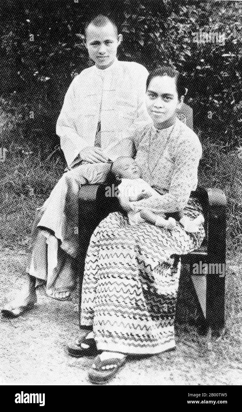 Burma / Myanmar: Bogyoke Aung San, Daw Khin Kyi and their first son Aung San Oo, c.1943.  Bogyoke (General) Aung San (13 February 1915 – 19 July 1947) was a Burmese revolutionary, nationalist, and founder of the modern Burmese army, the Tatmadaw. He was a founder of Communist Party of Burma and was instrumental in bringing about Burma's independence from British colonial rule, but was assassinated six months before its final achievement. He is recognized as the leading architect of independence, and the founder of the Union of Burma. Stock Photo