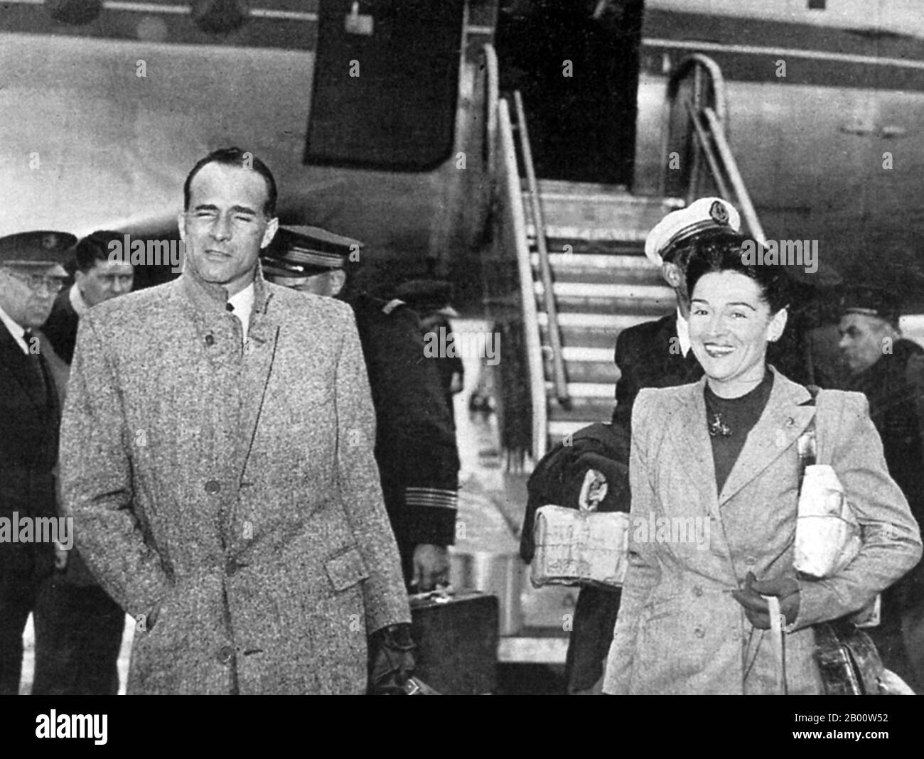 Vietnam: Major Jean Sainteny and his wife arrive at Orly Airport, Paris, shortly after brokering a pact with Ho Chi Minh which subsequently fell through.  Jean Sainteny or Jean Roger (May 29, 1907 in Vésinet - February 25, 1978) was a French politician who was sent to Vietnam after the end of the Second World War in order to accept the surrender of the Japanese forces and to attempt to reincorporate Vietnam into French Indochina. He reached an agreement with Ho which would have kept Vietnam in the Union francaise. The agreement became ineffective after the French bombing of Haiphong. Stock Photo