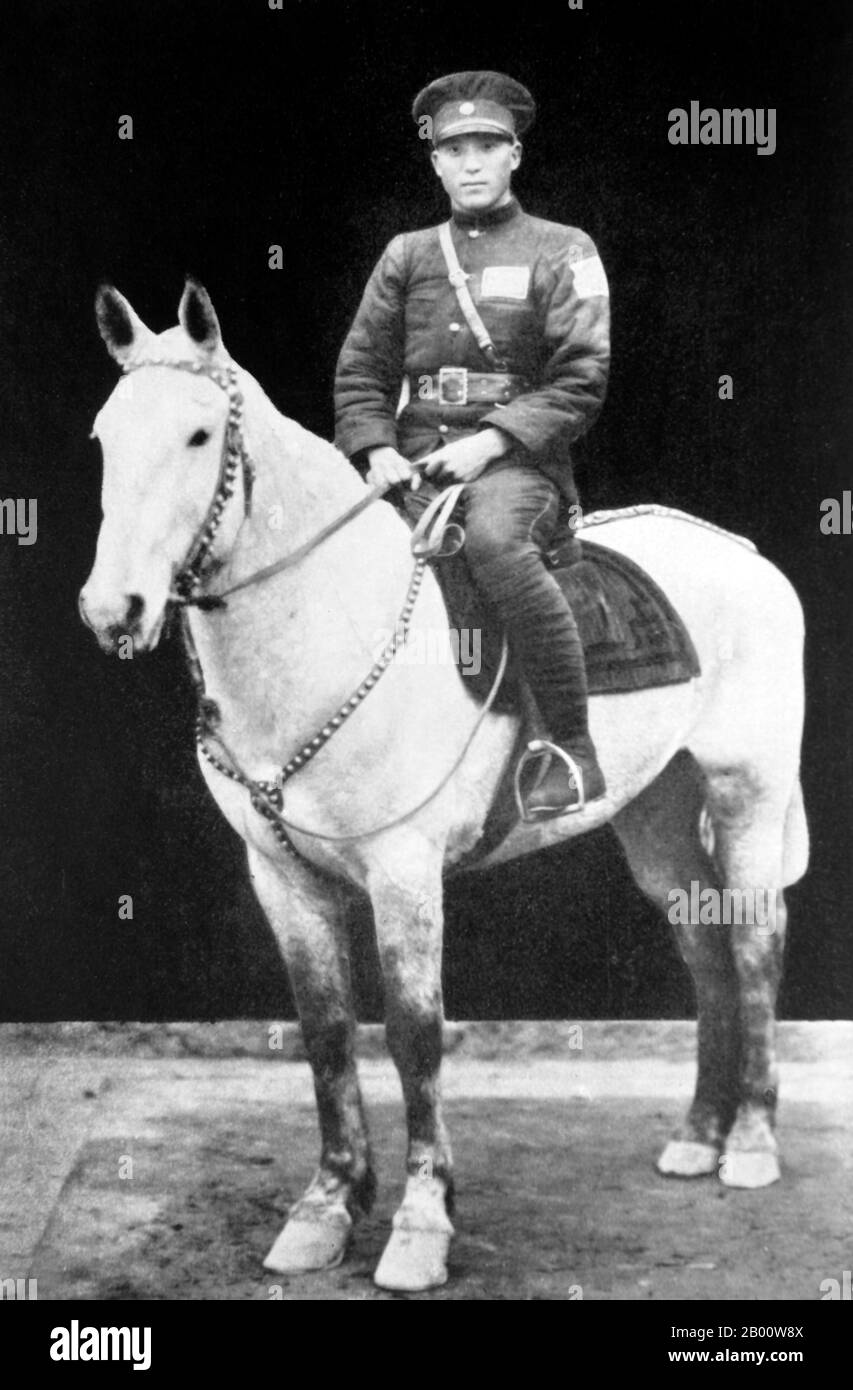 China: Ma Zhongying (Ma Chung-ying, c. 1910-1937) on horseback, wearing KMT 36th Division uniform, c. 1933.  Hui Muslim general and scion of the Ma Clique of Northwest Muslim warlords during the Chinese Republic (1911-1949).  The Ma clique is a collective name for a group of Hui (Muslim Chinese) warlords in northwestern China who ruled the Chinese provinces of Qinghai, Gansu and Ningxia from the 1910s until 1949.  There were three families in the Ma clique (‘Ma’ being a common Hui rendering of the common Muslim name, Muhammad), each of them controlling one area respectively. Stock Photo