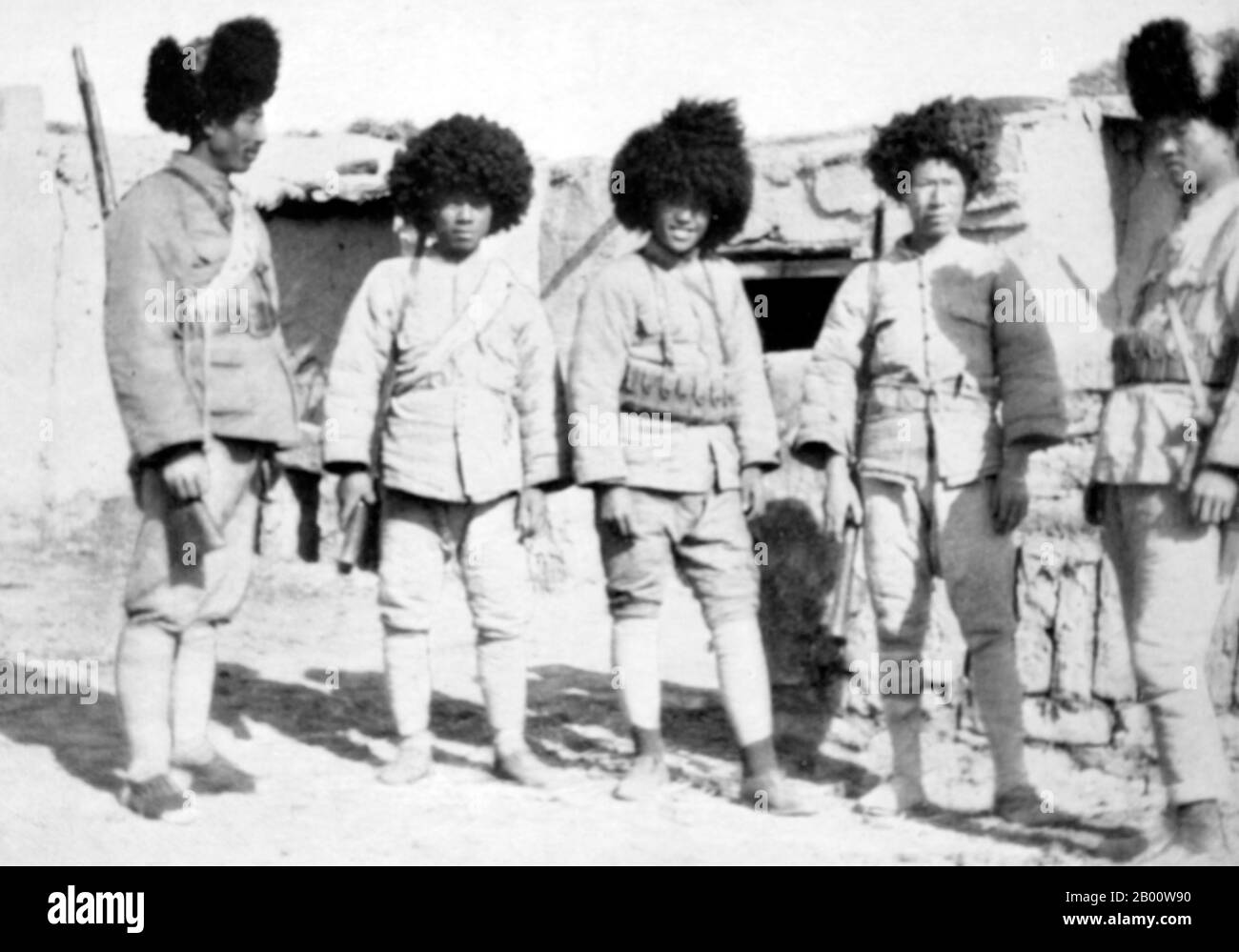 China: Tungan (Hui Muslim) soldiers in winter uniform, c. 1933  The ethnic Hui people are mostly concentrated in northwestern China and have an estimated population of about 10 million. They are ethnically similar to the Han, except for their practice of Islam. Many Hui are direct descendants of Silk Road travelers. Stock Photo